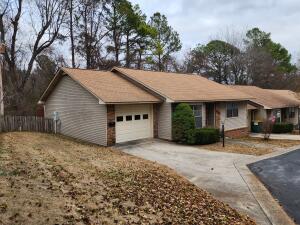 You'll feel peace, seclusion and privacy in this well maintained 2BR Condo in the pretty little White Oak Condo Community where winding, lamp post lit streets and pretty landscaping make it feel magical in every season. This particular condo is one of the larger ones with a wood burning fireplace and lies at the end of the road with a privacy fence on one side, a spacious 8 X 17 wooden deck and a forest behind the fenced lawn. Lawncare and swimming pool with pool house privileges come with the HOA monthly fee. The Master Bedroom has it's own private 1/2 bath with a wa/dr in it and access to a shower room, then the other 1/2 bath also has private access to the shower. All appliances convey. There's an oversized single car garage with storage room and an enclosed, well lit sunroom.