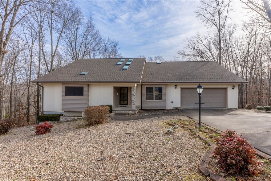 Unlock the potential of this 3,688 sq ft estate situated on a rare double lot. While the kitchen and bathrooms are ready for a modern revival—along with fresh paint and flooring—the high-ticket infrastructure is already pristine. Enjoy total peace of mind with a 2022 Heat Pump, 2020 Roof, 9 New Skylights (2020), and 2024 Gutters with Leaf Shields. This 4BR/3BA home features two sprawling living areas, two fireplaces, and a sunroom bathed in light. Outdoor living is perfected with a premium Trex upper deck and a freshly power-washed lower deck overlooking a zero-maintenance yard. Don't miss the 840 sq ft of ducted bonus space on the lower level! Priced to sell AS-IS (safety/health only), this is the ultimate blank canvas to create a high-end masterpiece in a rock-solid shell.