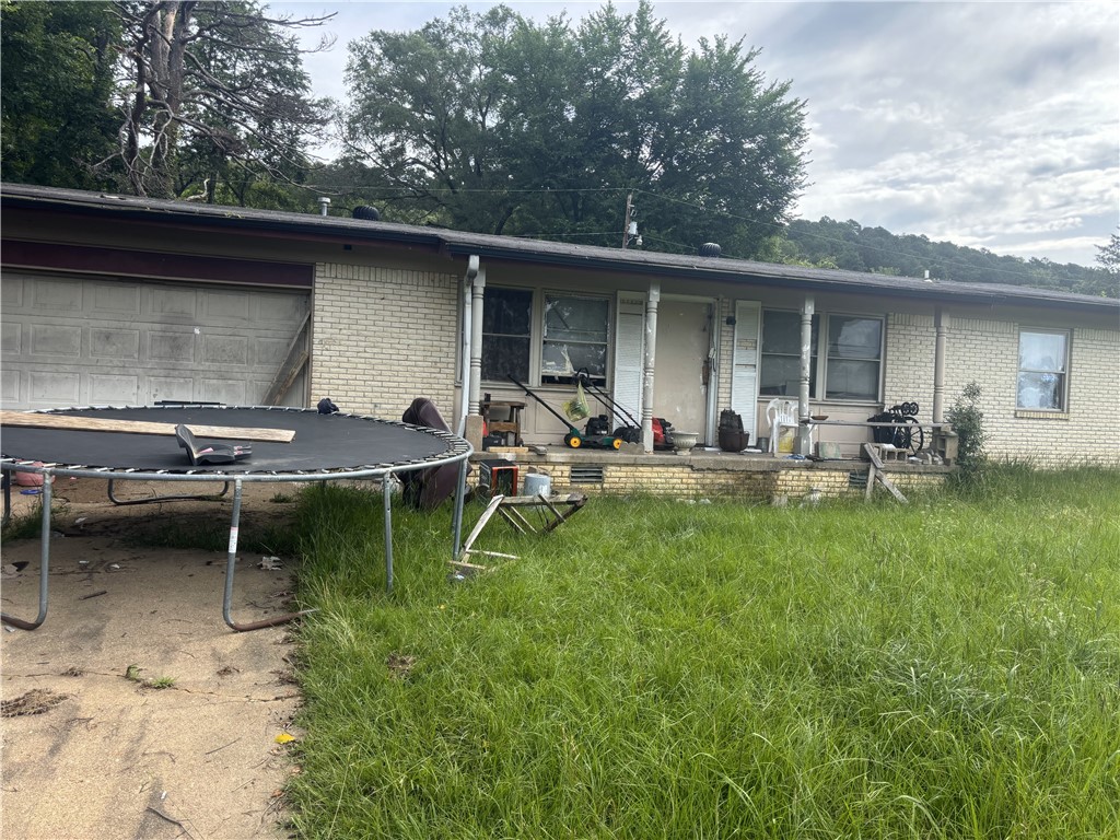 Investor Special – Priced to Sell!- This 3-bedroom, 2-bath brick home is priced right and ready for a rehab! With solid bones and tons of potential, it’s the perfect opportunity to start or grow your investment portfolio. Located near bike trails, a local park, and daycare facilities, this home is ideal for future tenants or resale. Whether you're flipping or holding, the location and layout offer excellent upside. Don’t miss your chance—this one won’t last long!