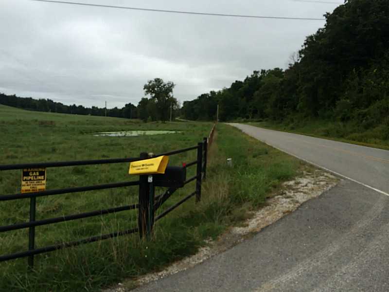 Scenic and productive cattle ranch on paved road. Good mix of bottom land and high pasture, bermuda & fescue. Property includes a three bedroom two bath frame home.
