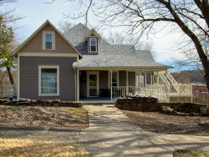 This home has been beautifully renovated & restored to its original footprint. The original space has been expanded to accommodate the largest family. Original hardwood floors in living room, dining room, kitchen, 2 1/2 bathrooms; 2nd floor contains a great bonus family room with 3 bedrooms, a full bath & loads of storage space. Plenty of space for a large family. Every surface in this home has been updated. New windows on the 2nd floor. Original windows on the first floor have been restored. All systems including plumbing, electrical, 2 HVAC units, were new in 2003 & the house qualified for a new home discount for insurance. A tenant occupies the upstairs apartment that has an outside entrance but also has access to the upper floor New roof in 2018. This home is