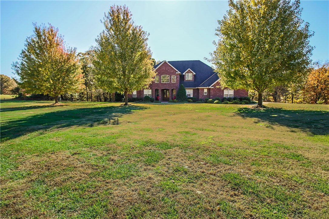 Magnificent country estate sitting on 10.64 acres featuring a custom home w/1000 SF pool/guest house all sitting behind your own private gate. Home boasts gourmet kitchen open to family room, large DR, office/6th BR. Master retreat includes 2-sided fireplace, spa-like bathroom & luxurious closet w/its own private nook opening up to laundry room. Split staircase leads to 4 bdrms, 2 jack-n-Jill baths, media room & 2nd laundry room. Outside is a large screened in porch, heated 8’ deep gunite pool w/ swim-up bar & pool/guest house w/open kitchen & living area, bedroom, full bath & laundry. The abundant acreage can be enjoyed sitting by the fire-pit, playing on the basketball court, riding 4-wheelers, hunting or working in the barn. Interior Photos Coming Soon!