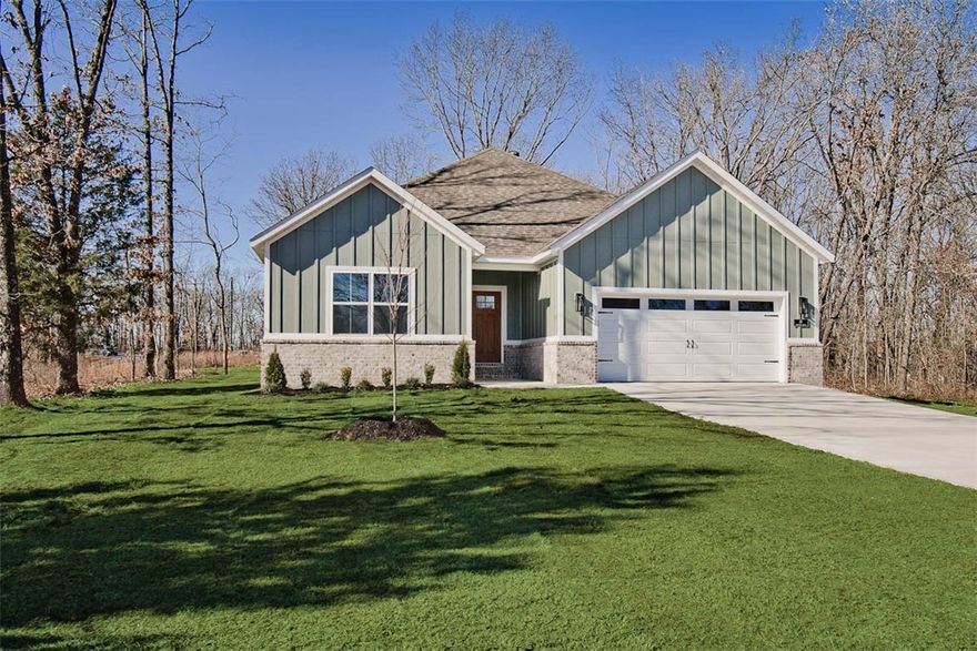 New construction on a flat .32 acre wooded lot located close to Branchwood Nature Trail, Scotsdale Golf Course, and Lake Loch Lomond!  Step inside to discover an inviting open concept design featuring 10’ ceilings and beautiful floors that enhance the spacious feel of the home. The stylish kitchen is equipped with a gas range, 3 cm quartz countertops, custom cabinets, and a walk-in pantry. Entertain or unwind in the living area, complete with a stunning fireplace, or step out onto the covered patio to enjoy the peaceful surroundings. The primary suite features a massive walk-in tile shower and closet. 2 bedrooms + office. Buyer can receive $3,500 in closing costs when using the builder's preferred lender!