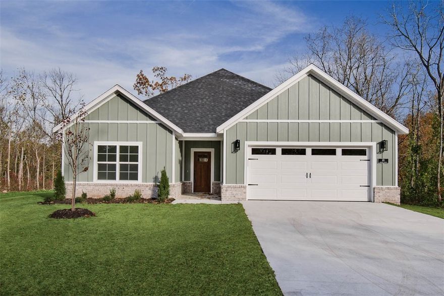 New construction on a flat .32 acre wooded lot located close to Branchwood Nature Trail, Scotsdale Golf Course, and Lake Loch Lomond!  Step inside to discover an inviting open concept design featuring 10’ ceilings and beautiful floors that enhance the spacious feel of the home. The stylish kitchen is equipped with a gas range, 3 cm quartz countertops, custom cabinets, and a walk-in pantry. Entertain or unwind in the living area, complete with a stunning fireplace, or step out onto the covered patio to enjoy the peaceful surroundings. The primary suite features a massive walk-in tile shower and closet. 2 bedrooms + office. Buyer can receive $3,500 in closing costs when using the builder's preferred lender!