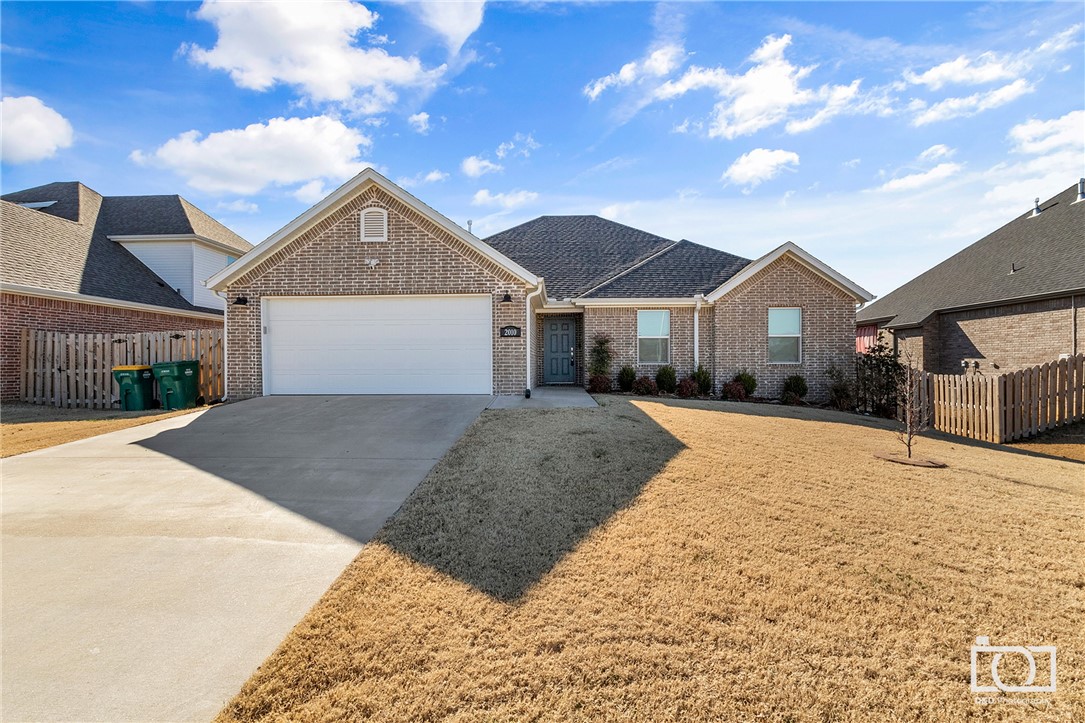 You will love this charming home nestled in the Chandler Run Subdivision in Rogers. Only minutes from I-49 with easy access to shopping and recreation. This home has been meticulously maintained and offers a spacious split floor plan with the perfect color scheme throughout. The kitchen opens up to the living space with the fireplace that is framed by windows that let in ample natural light that fills the room. This home is perfect for entertaining guests with a large fenced in backyard. Hot tub, ring doorbell, and garage camera conveys. This one is a must see!!! Seller will review all offers on Sunday, February 6th at 5pm.