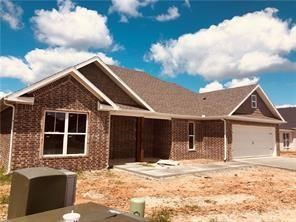 There are lots of extras in this all brick beautiful Craftsman style home! This homes features an open floor plan, upgraded trim package, 3 cm granite counters, built-in cubbies, walk in closets, soaking tub and covered porch. The popular wood look vinyl flooring is throughout the home except wet areas that have tile. Privacy fence, blinds and gutters are standards in all the Seay Construction homes. Hazelton Heights is conveniently located to the top rated Pea Ridge Schools. This home qualifies for 100% financing via RD loans.