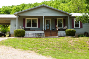 Nicely tucked away.... you'll find this beautiful home a short drive from town. This well-maintained 4BD/2BA home gives plenty of room to grow and play outdoors! Beautiful Kitchen! There is a large deck for a swimming pool at the back of home. Enjoy your quiet Country living outdoors with Wildlife abundant! Metal Roof & Electric Water Heater replaced in 2010. Bergman or Harrison School Bus available to pick up children!