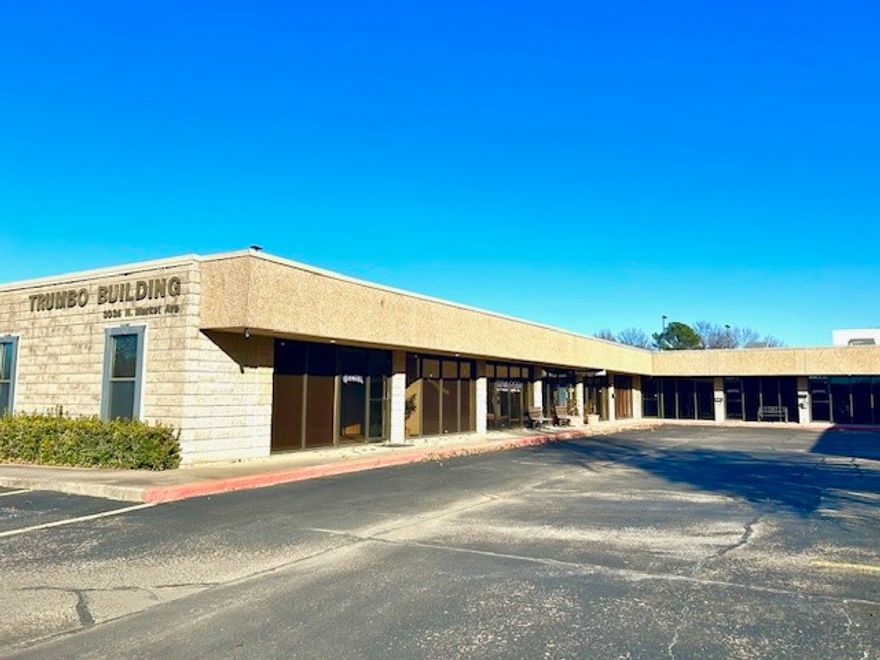 The Trumbo Building has been a well known north Fayetteville office building since 1976.  The space features a front door facing the main parking lot and also has an overhead door in the rear of the space (east side).  The space could be used 100% for office or use some of the space for storage.  The space will require renovation prior to occupancy.  Tenant improvement allowance is negotiable depending on tenant, length of lease and rate.  Landlord is offering a modified gross lease with tenant paying for electric, gas and all other business utilities and landlord paying for water, sewer and trash and common area maintenance.  The space has one restroom and plumbing for another sink area.  Great location in the middle of Fayetteville with easy access to College Ave, I-49 and Highway 265 (Crossover Rd).  The space is adjacent to another 1,022 sf (Suite B) that is available shown on MLS # 1285087.  The two spaces can be combined for a total of 2,927 sf.