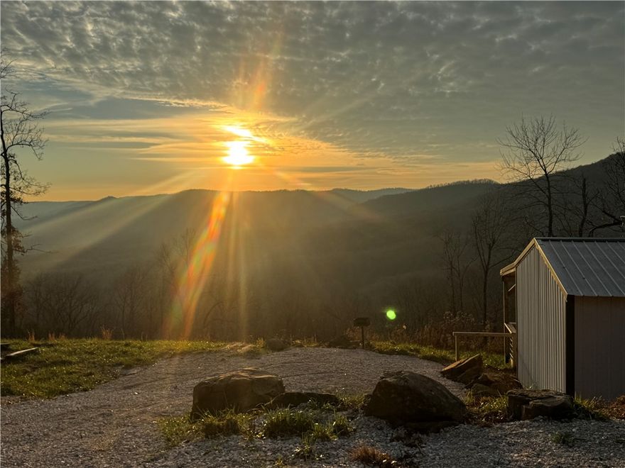 Great short term rental opportunity in the Ozark Mountains of Newton County, Arkansas awaits! Two cabins with 3.45 stunning acres and an amazing view. The cabins are both 600 sq feet, 1 bedroom, 1 bath with 300 sq feet per cabin of covered porches which are perfect for relaxing, entertaining, and watching unforgettable sunsets that look over the Little Buffalo Valley and distant mountain peaks. The cabins are not yet complete - both still need a few finishing touches. A new well has been drilled for the property and access to a year-round spring if needed. Outdoor enthusiasts will appreciate the endless opportunities nearby, including rock climbing, biking, hiking, kayaking, and exploring the Buffalo National River. The property is also conveniently located just minutes from Jasper, offering restaurants, shops, and the inviting charm of small-town Arkansas. Whether you're seeking a short-term rental investment, a mountain retreat, or both, this property captures the very best of Ozark living and adventure.