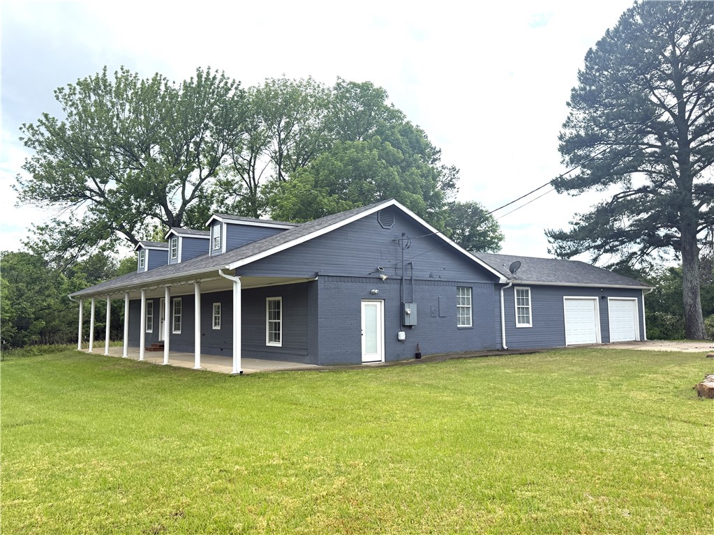 Discover comfort, space, and convenience with this beautiful 4 bedroom, 3 full bath home set on just under 4 acres. Located just minutes from both Dover and Russellville, this property offers the perfect balance of privacy and accessibility. Inside, you'll find a spacious layout ideal for families or entertaining guests, with a large living area and kitchen, with plenty of natural light. The home includes two private en-suites for added flexibility. Step outside to enjoy your acreage — perfect for gardening, recreation, or simply soaking in the serene landscape. An outbuilding offers excellent storage or workshop potential, while the proximity to the Russellville Golf Course and Lake Dardanelle makes it a dream location for outdoor and golf enthusiasts alike. Don't miss your chance to own this rare combination of space, location, and lifestyle!