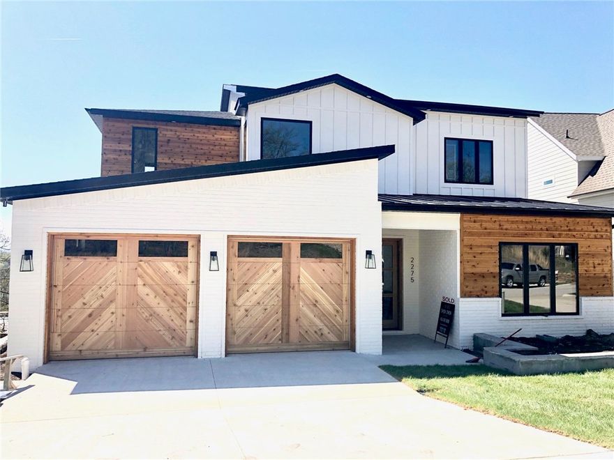 Incredible central Fayetteville location with beautiful views. New construction by Ben Booth of Booth Building & Design. Schools are Root, McNair, and Woodland.