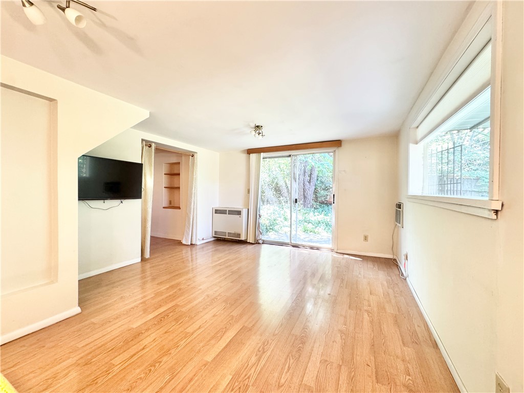 Adorable studio rental available in the heart of Fayetteville! This property features a bedroom space with two closets, a full bathroom, kitchen and living space. Property has a shared backyard and a private side yard accessed by sliding doors from the living room. Water included.