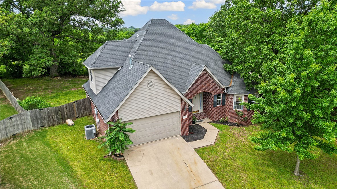 Motivated Seller! Nestled at the end of a cul-de-sac with no neighbors behind, this lovely two-story home offers privacy, space, and comfort. The open-concept layout features a soaring living room ceiling that creates an impressive central gathering space. Just off the living room is the primary suite, complete with an en suite bathroom. A half bath on the main floor provides comfort for guests, while upstairs you'll find brand new carpet throughout, fresh paint, and updated tile in the bathroom—making the upper level feel fresh. But the true highlight of this home is the serene backyard. Backing up to a quiet pasture, you'll enjoy exceptional privacy and a peaceful ambiance that's rare to find—especially this close to everything Northwest Arkansas has to offer. Just 2 miles from the interstate, you'll have quick access to all the shopping, dining, and entertainment options in the area.
Don't miss out—schedule your private showing today!