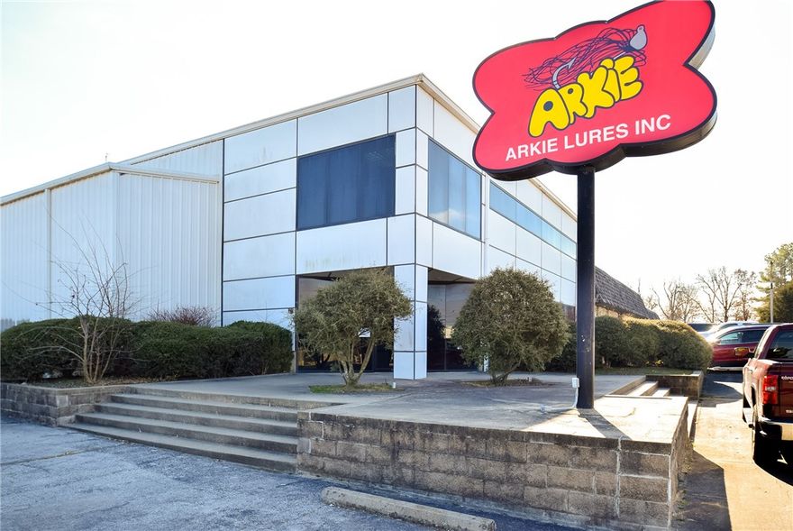 Great Buy on Manufacturing/Warehouse/Office facility in prime location with major road frontage (447' along Old Missouri and 429' along Ford St), great visibility and high traffic count!  Just across the street from Springdale Airport.   This property is located in the Opportunity Zone and provides some incredible tax incentives!  Zoned I-1.  Owner occupies half of the building and will vacate upon sale.  Tenant occupies the other half on month-to-month lease and will be relocating soon.