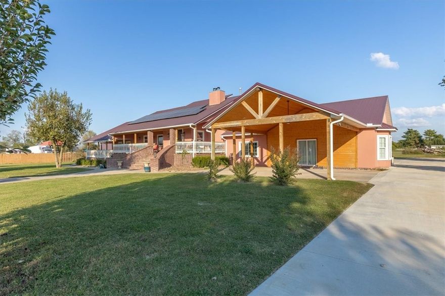 Are you looking For a suburban house-Ranch style with acres and a big metal/shop building for your business, and out of the city but a few minutes from it? well, look no further. Let me present you 5475 Colvin Pl, this mansion with 7 BD Rm (2 masters) 1 Loft (total 8 rooms), 4 complete Bathrooms (2 master walk in showers) 1 half Bath, 2 full kitchens, a living room, dining rm besides a breakfast rm, exercise rm, a full laundry rm and not to mention 3 car garage, besides 2 cart port garage (5 cars total and plenty driveway. The cherry on top of the cake is a Blast Solar Pannesl that covers the 4264 sq/ft with an electric bill of only $26 / month. But wait, all of these is sitting on 5 acres property wich include the +- 2.5 acres commercial business permitted shop with 13 parking spaces an office bulding( 2 Rm) and 2 extras small detached garages. The business has hours of operations of 6am - 7pm bus hrs M-F (buyers to check with county for their new business). After work you can go to Hickory Creek Marina Beaver Lk.