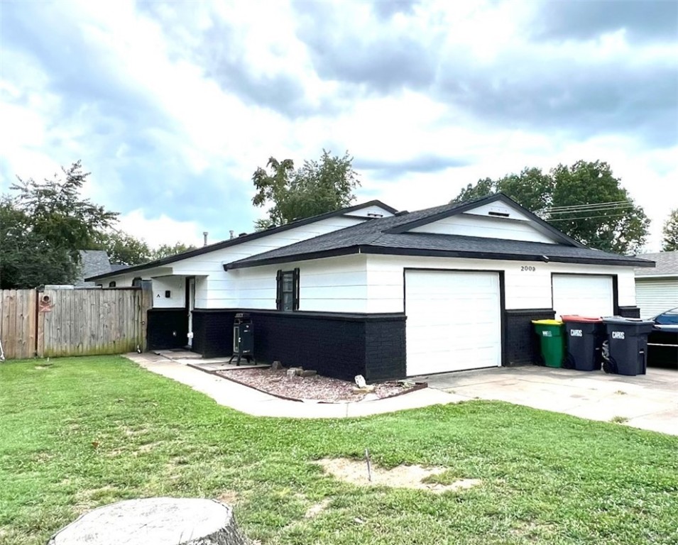 This townhome is 3 bed, 1 bath that has been a great rental. The garage was converted into a 3rd bedroom and a storage area. Located just 3 minutes from Johnson Square, 6 minutes to NWA Mall, and 8 minutes from Downtown Springdale, this turnkey property offers the perfect blend of convenience and potential. This property is situated only minutes from I49, is near shopping, restaurants, and all major amenities. Interior pictures are of unit 2007 B and is similar layout. Property is sold as-is and more units available for purchase.