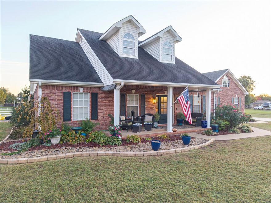 This beautifully updated 3-bedroom, 2.5-bath home with an office sits just north of Alma and blends comfort, function, and style. The spacious layout includes a large living room with a gas fireplace, an inviting eat-in kitchen with granite countertops, and a formal dining room—ideal for hosting or family time. The generous primary suite features double walk-in closets, double vanities, a jetted tub, and a tiled walk-in shower. Durable luxury vinyl plank flooring runs throughout. Outside includes a 2-car attached garage, 2-car detached garage with 220V, plus a 24x44 insulated metal building with 220V—perfect for a motorhome, camper, or workshop. Sitting on 1.29 acres, the property offers beautiful landscaping, rock work, and mature trees. Major updates include a 2016 roof and 2018 AC/heat pump. Fantastic location—about 5 minutes to both I-49 and I-40. Washer, dryer, refrigerator, and Hustler commercial mower may convey with acceptable offer.