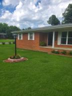 All brick home right in town in a great walking neighborhood. Easy and quick access to the interstate. Home is well maintained, 3br and 2 baths with a fenced in yard. Refrigerator, washer and dryer will remain.