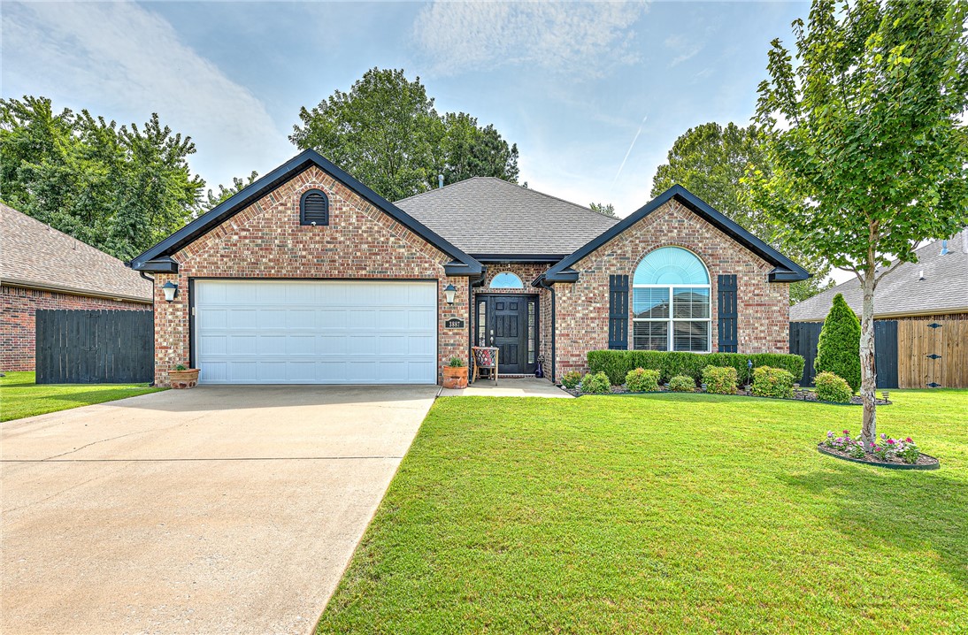 The pictures show it all - from the beauty of the house, to the landscaping, to the meticulously maintained interior - discover your ideal home in this inviting 3-bed, 2-bath house. Inside, you will find an open floor plan featuring elevated ceilings, wood floors, and an eat-in kitchen. Retreat to the serene master suite that has plenty of space in the walk-in closet. Enjoy outdoor living in the backyard under your covered patio with the wonderfully maintained yard - shed included! Located moments from Lake Fayetteville, Springdale Country Club, Botanical Gardens, numerous parks, and so much more, the ease of access to Don Tyson Pkwy will have you anywhere in no time. Don't miss out on your chance to call this home!
