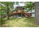 Completely remodeled in 2020 and just 1 mile from the University of Arkansas, Razorback Stadium, and Dickson Street, this spacious 4-bedroom, 3.5-bath home offers over 3,400 sqft of modern living in a prime Fayetteville location. Every major system has been upgraded, including a new roof, siding, windows, two HVAC units, hot water heater, plumbing, electrical, and added insulation. Inside, you’ll find fresh paint, new carpet and vinyl flooring downstairs, and a bright, open layout with cathedral ceilings. The kitchen features a large island with bar seating, granite countertops, stainless appliances, and a built-in wine fridge. The primary suite includes a walk-in closet, jetted tub, and a huge walk-in shower. Outside, enjoy fresh landscaping, new sod, a freshly stained front patio, and a newly stained deck that runs the full width of the home. A nearby trail at the end of the street connects directly to campus, adding even more convenience to this beautifully updated home.