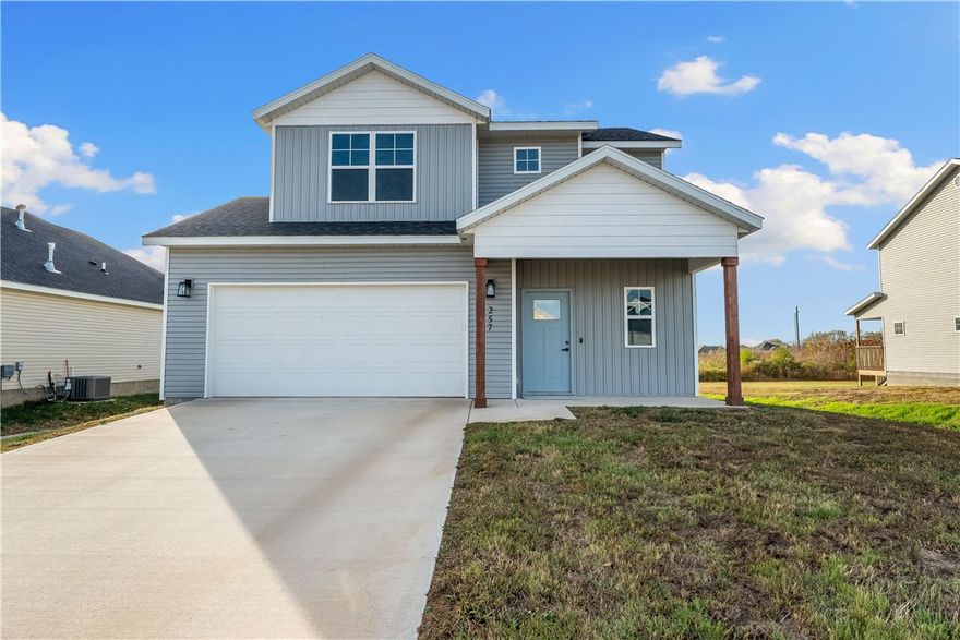Welcome to Phillip's Park! Beautiful quality New Craftsman style homes in the center of it all in Gentry; close to Gentry Schools, City Park, and Gentry Splash Pad. The home features 3 bedrooms, 2 full bathrooms, walk in closets, linear gas fireplace, large laundry room, fenced in backyard and covered porch. Complete with vinyl siding, brick, and double pane windows for energy efficiency and curb appeal.