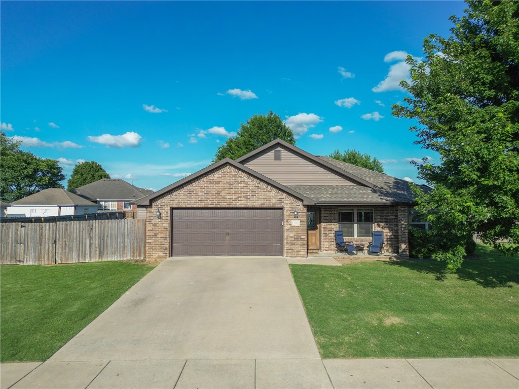 The one everyone’s been waiting for—well-kept, easy-living, and sitting on a large corner lot. This 4-bedroom split floor plan offers space where it counts, with a big central living area and open eat-in kitchen with stainless steel appliances and bar seating. Covered front and back porches make indoor-outdoor flow a breeze, and the fully fenced yard adds privacy. The master has a trey ceiling and a quiet, tucked-away feel. Move-in ready and easy to make your own.