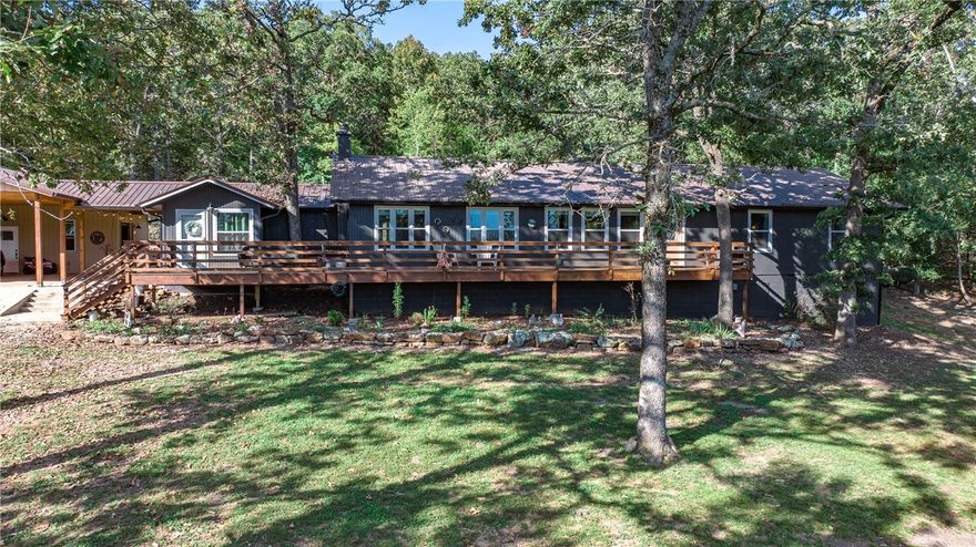 Peaceful easy living at this 4 bedroom and 3 bathroom ranch type home nestled on 5 acres at the edge of town. Feels so private and you can relax on the front deck or enjoy the huge covered patio. Spacious open living area with split bedrooms, large 3 car carport with attached shop, and small pole barn. Make your appointment to fall in love with your new home! Approved borrowers will receive a closing cost credit of 1% of the loan amount up to $5,000 on their Closing Disclosure on their loan closing with Envoy Mortgage Branch NMLS #2659248 and Branch NMLS #2579798.