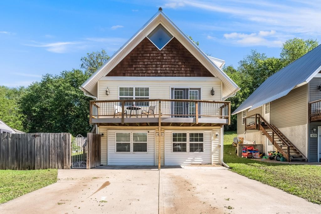This spacious home in Siloam Springs, features a unique two level design perfectly suited for versatility. With four bedrooms, three bathrooms, it offers ample space for families or guests. The upper level is designed for comfortable living, boasting an open floor plan with a modern kitchen, a cozy living room, and the primary bedroom with an ensuite bathroom. The lower level is completely secluded, providing a private entrance, making it ideal for a rental unit or a mother in law suite.