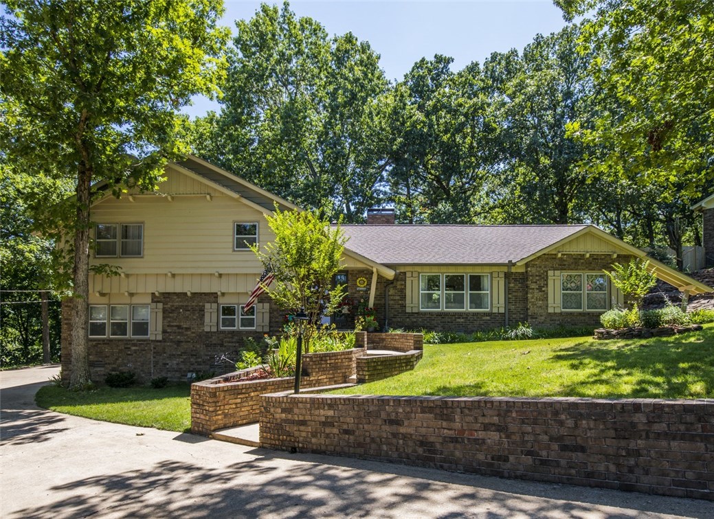 "You will love this home!" This lovely house sits on .47 ac. with lake view. Flower beds are filled with annual/perennial plants & mature trees frame back yard to reflect a magical retreat. Home upgrades: 2014 Mbath & 1/2 bath remodeled, HVAC hospital filters duct work; 2015 New roof & paint on house & shed, BBB Septic tank pumped/insp./added access riser, built kids fort w/play area; 2018 New gutters installed on house & shop building, built detached two car garage; 2019 main garage floor repainted.