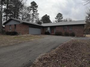 Located on a quite dead-end street, this spacious traditional is loaded with goodies. Updated kitchen, Metal roof and luxury flooring make this a must see. Warm up next to the fireplace and enjoy the fenced backyard. Large, dedicated laundry room & tons storage. Easy to show! Call your agent today.