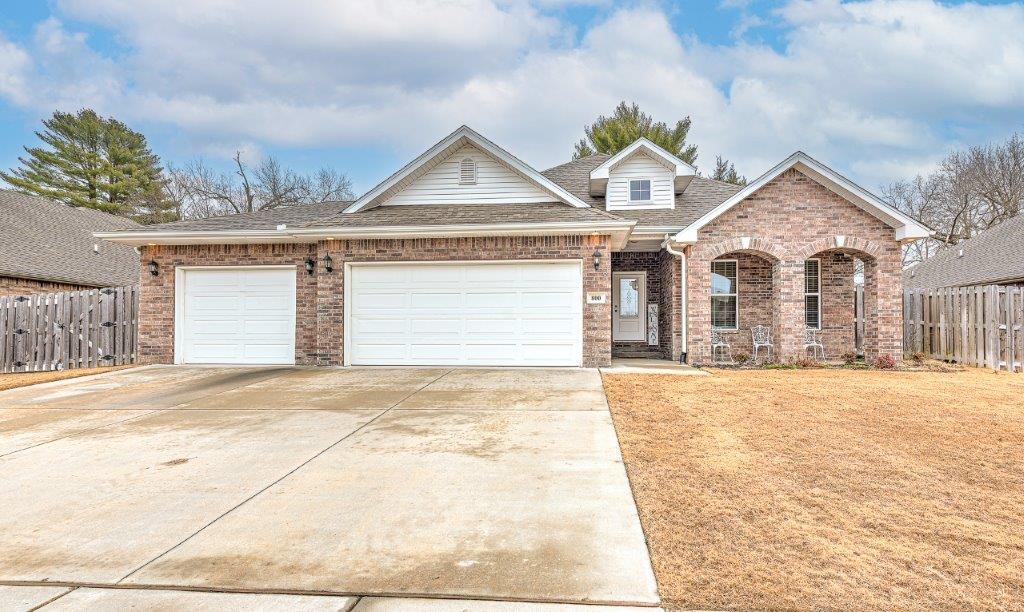 Built in 2021, this 3 bed/2 bath open-concept home has all the extras ā full-yard sprinkler system, whole-house generator, 12x8 storage shed, wood privacy fence with double gate, alarm system, 3-car garage w/insulated doors, and, currently, the 3rd stall is being used as a heated and cooled workshop! In addition, the washer, dryer, and kitchen refrigerator convey! This home boasts a brick exterior; granite countertops throughout; eat-in kitchen with gas range, island, and pantry; electric fireplace in the living room; and 2 covered patios! The large primary suite with walk-in closet is situated at the back of the house. Conveniently located near downtown Pea Ridge and just 12 minutes from the new WMHO, this house is a winner!