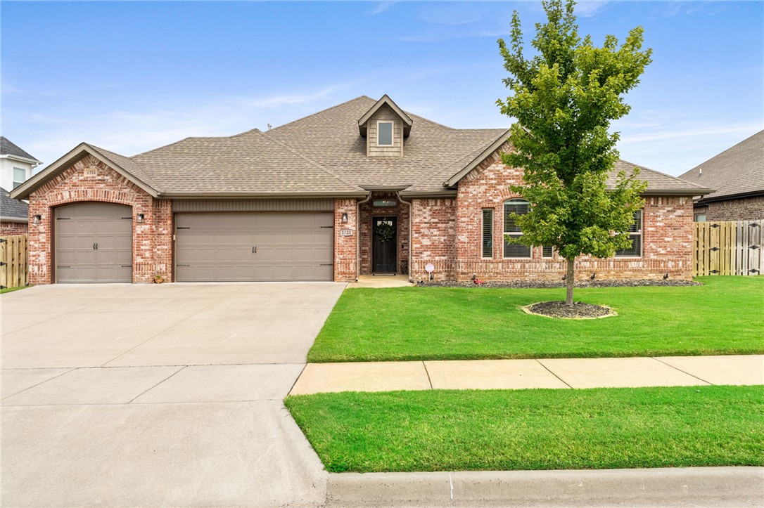 This LIKE NEW home is one level and has SO many upgrades, such as a Whole Home Generator, Security System, Kohler fixtures, Air Filter, Built-ins in the living room and gorgeous beams at the ceiling. There is added shelving at the end of of the island, a built-in desk in the bedroom nook, an amazing wraparound closet in the master, a sink in the laundry area and a drop zone in the mud area. The kitchen boasts a gas cooktop and walk-in pantry. The home has a solid hardwood floor, a fireplace on the epoxy, covered patio, an outdoor 42 inch flatscreen TV which will remain and is included in the sales price, a large backyard and privacy fence for relaxing and entertaining plus a central vac, irrigation front and back, insulated garage doors, epoxy garage floor and floored attic space. Refrigerator, washer and dryer is included with full-price offer. This is truly a MUST SEE home!
