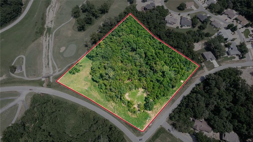 LAND in Bella Vista! This is a rare opportunity! Build your dream home on this oversized corner lot! This land is fairly flat, partially wooded and backs up to the 18th hole of the Scottsdale Golf Course. Land has been surveyed, has a 2-3 bedroom perc test result, approved architectural site plans and preliminary wastewater permit.