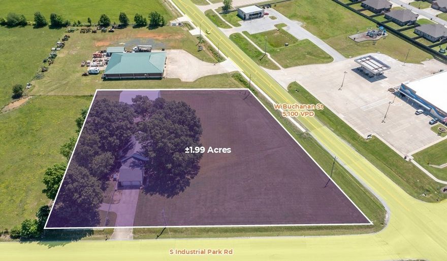 Frontage: ±297 linear feet on W Buchanan St and ±377 linear feet on S Industrial Park Rd with excellent visibility.  The property features a single-family residence (±2,337 SF), shop (±2,500 SF), and storage (±800 SF).  Prime location at the hard corner of of W Buchanan St and S Industrial Park Rd.  Located across the street from Prairie Grove Public Library and Subway.  Flat, cleared and ready for immediate development