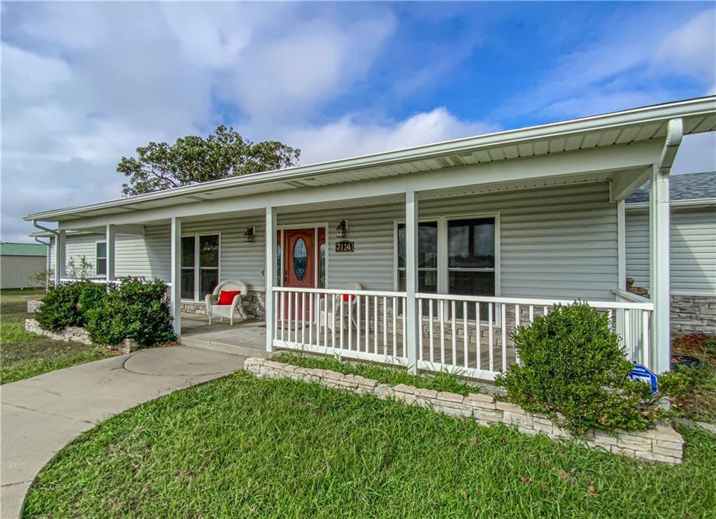 All reasonable offers will be considered on this incredibly unique property! The gorgeous updated home includes 3 bedrooms, all of which have private access to 3 restrooms. Large Open kitchen boast bright modern features including granite countertops, vinyl flooring and a hidden pantry space. Matching top of the line appliance will convey. Looking for a man cave or a business opportunity? We have both covered with the 30x40 metal shop building and a second building with 2000 sq ft that was previously the āThe Gunmanā business, complete with a private gun range in the rear. Commercial building could easily be converted to a guest home or mother in law unit. Large covered back patio to sip morning coffee or bird watch. Storm shelter is just steps off the back patio. Water softener, whole house generator and 2 wood burning fireplaces. 2 shop buildings with electric, Too many features to list all of of them in this beautiful property! 19.68 acres with Highway frontage- Property is being sold āas isā
