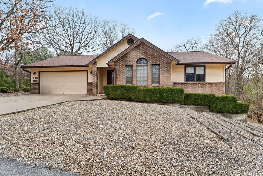 Corner lot in a fantastic location - just a half mile (or 2 minutes) to Branchwood Recreation Center complete with disc golf course, pickleball courts, a 1.25mi nature trail and a playground! 3 Bedrooms and 2 Full Baths, plus a large Sunroom overlooking the backyard. Hard-surface floors throughout the home. Granite counters. Wood burning fireplace. All gravel yard and surroundings for easy maintenance. Storage basement big enough to drive a golf cart into. This home is ready for your updates! *Additional .30 acre lot next door is available for $15,000*