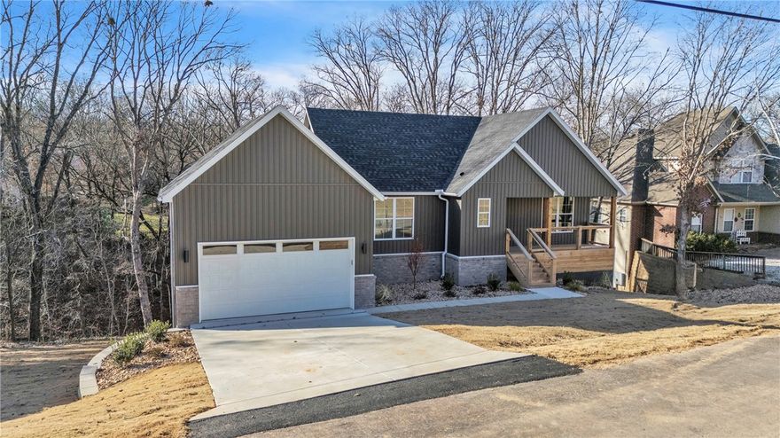 Back on the market—better than ever! This exceptional new construction in Bella Vista blends modern design, energy efficiency, and an unbeatable lifestyle location.

Offering 3 bedrooms, 2 full baths, and 1 half bath, this thoughtfully designed home features approximately 2,215 sq ft of finished living space, a full finished daylight basement, and sits on 0.38 acres with the convenience of city sewer.

Outdoor enthusiasts will love being just minutes from the Back 40 trails and Razorback Greenway extension, along with nearby Mayfield Park (pool, playground, bike park, pickleball, and golf) and close proximity to Lake Brittany.
Built for efficiency and comfort with:
* Full spray foam insulation envelope
* Dual-fuel hybrid HVAC system with zoning
* Energy-efficient vinyl double-pane windows
This home delivers the perfect blend of modern living, efficiency, and Bella Vista’s sought-after trail lifestyle.