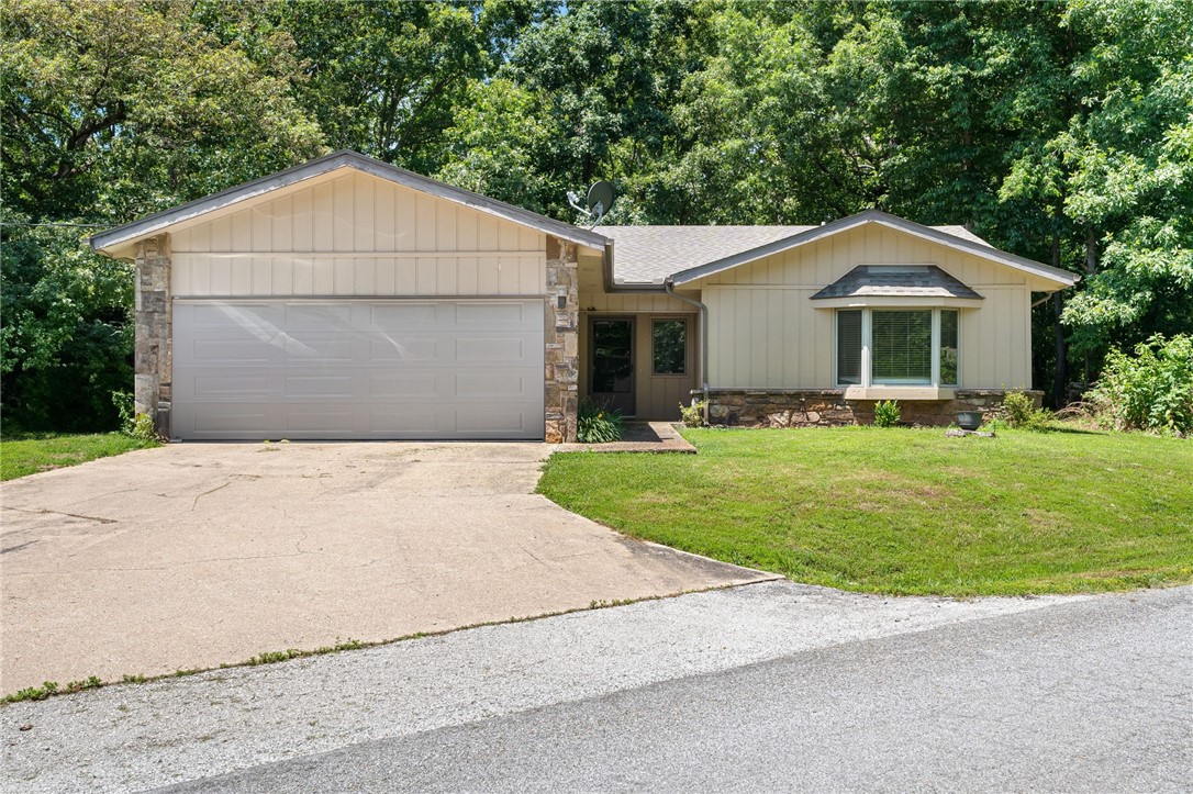 Charming 3-bedroom, 2-bathroom home, boasting 1,610 sq ft of opportunity to add your personal touch. Positioned on a flat .29-acre corner lot, this property features a 2-car garage with new overhead door and a handy shed for extra storage. The interior offers vinyl plank flooring and agreeable wall colors. Shed conveys. Wood exterior siding. Washer, dryer, refrigerator, dishwasher, oven all convey. Newer: Water heater, Furnace and Air Conditioner