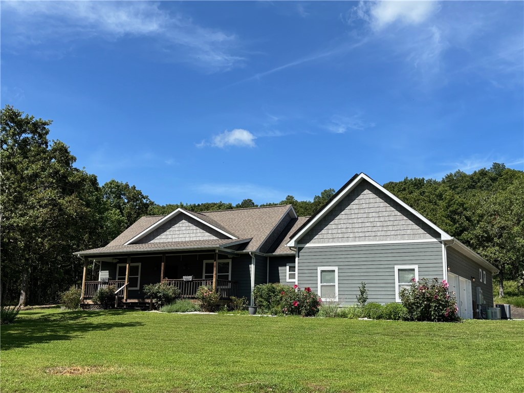 Check out this beautiful 3 or 4 bedroom with the option of a fifth sleeping area if needed. Situated on 10.44 mostly wooded acres and featuring a 38'x54' shop with 14' overhead doors. Shop is partially plumbed for an office or studio apartment. The home has a covered front porch and back deck to enjoy your mornings and evenings, and a long list of amenities! Just minutes from Walmart and downtown Harrison, the Hub of the Ozarks. Close to multiple fishing, hunting, camping, hiking, and sightseeing venues. Only 45 minutes to Branson MO, Table Rock, Taneycomo, and Bull Shoals Lakes, the White River, and within 20 minutes of the Buffalo National River. A great place to call home and enjoy the Ozarks!