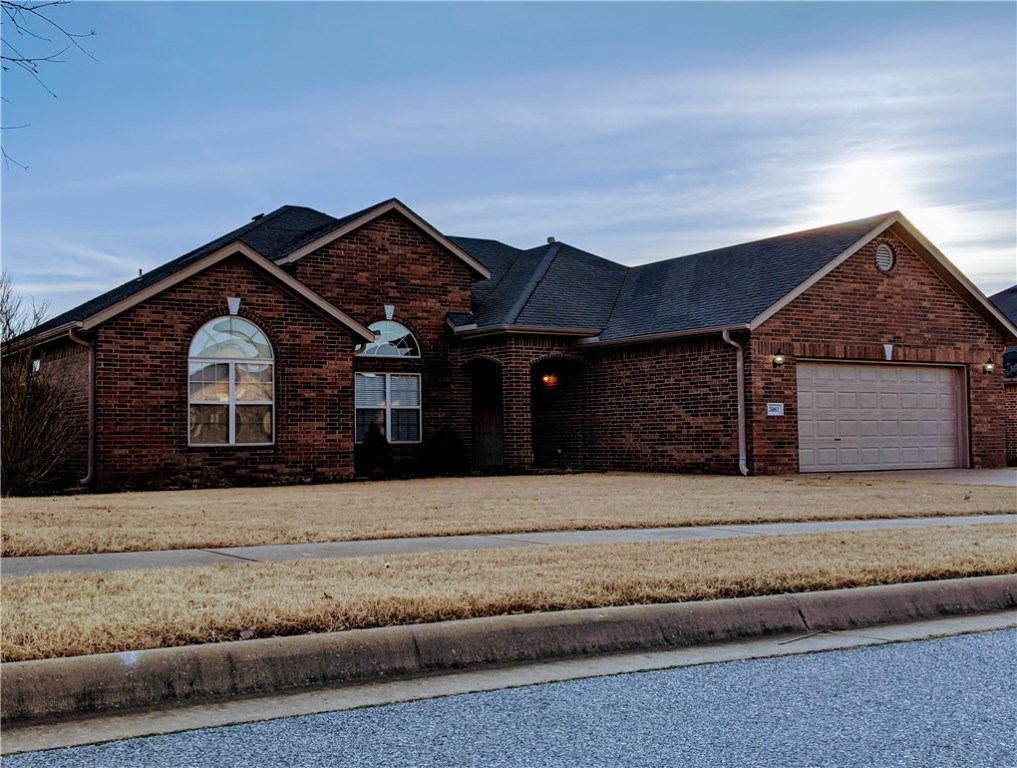 Strategically-located toward the edge of Fayetteville and in the Farmington school district, this extremely well-kept home waits expectantly with all new paint, new carpet, Ecobee 4 smart thermostat with built-in Alexa, Ring doorbell and intercom, a wonderfully spread-out floor plan, and spacious backyard. The home is minutes from plethora eating and shopping and I-49 access in Fayetteville and to the other side, Farmington's newest park and swiftly growing community. Situated south of West Wedington behind a serene, sprawling field, this home is an empty page clean and ready to be written with the life of the new owner. Just so welcoming for any person at any stage of life or need, 5061 W Tumbleweed is a wonderful house that simply wants to and needs to be a home again.