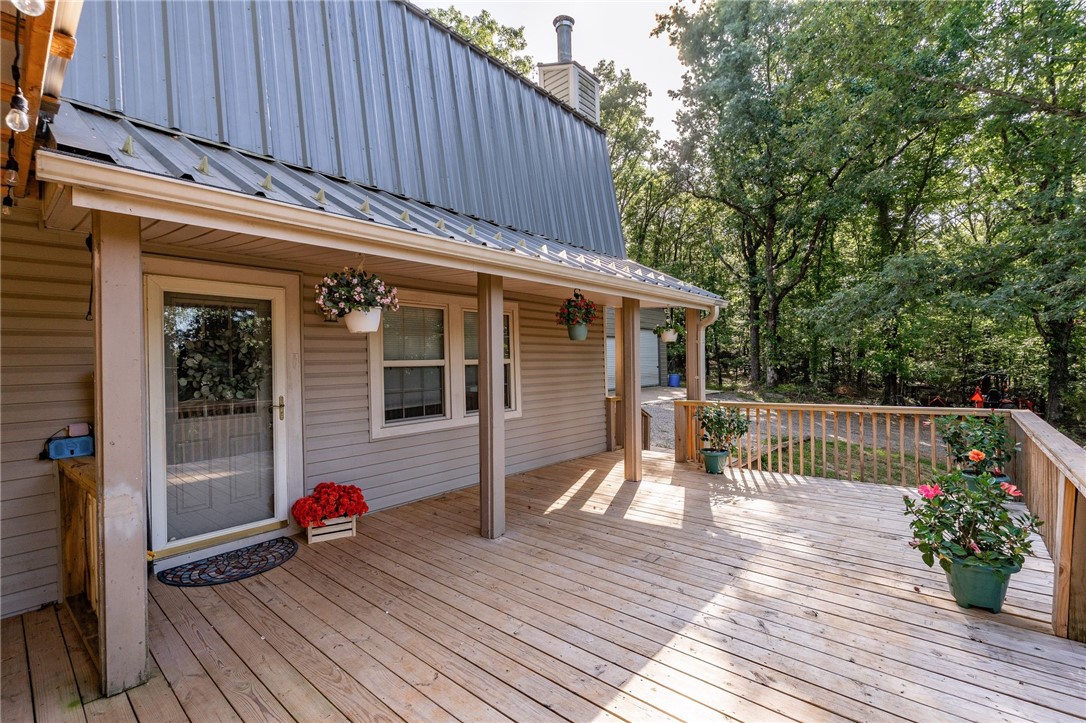 One price, three homes, one incredible opportunity! This rare opportunity puts three complete homes on 18.21 +/- peaceful acres—a flexible and value-packed package that feels more like a retreat. Home #1 (800 Barton Hill Ln) boasts 4 bedrooms and 2.5 baths 2,289 sq ft, Home #2 (918 Barton Hill Ln) is a cozy 3 bedroom, 1.5 bath (~1,152 sq ft) with its own fenced yard, and Home #3 (926 Barton Hill Ln) offers 3 bedrooms and 2 baths (~1,160 sq ft). Live in one and rent the others, share with family, or build income—this setup adapts to your needs. With privacy and plenty of space, it’s just the kind of spread hunters and outdoor enthusiasts love. Enjoy Lake Fort Smith - 8 mile drive to enjoy kayaking, boating, fishing, and abundant hiking trails. Combine smart layout, generous land, and lifestyle—and you’ve got a package that delivers opportunity, comfort, and rural charm all at once! **MLS information is based on 800 Barton Hill Ln.** 35 miles to Fayetteville, 30 miles to Fort Smith.