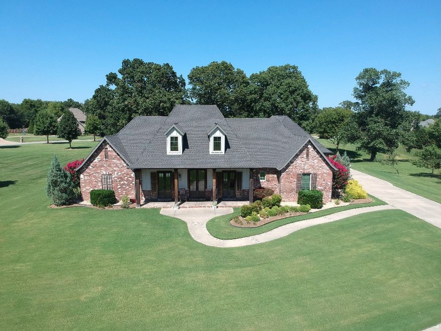 NEW ROOF IN AUGUST 2020 Stained concrete floors throughout home. Custom granite, built-in dining table attached to spacious island. Large media room and sitting area/office upstairs. Covered back porch with built-in EVO grill on 8ft granite island. Custom 9ft pool with stained concrete decking. ~3.3 acres with sprinkler system and underground fence for your animals. Excellent floor plan with extra large bedrooms. Ample 3 car garage with workbench area and large storage closet. This home provides the highly demanded one story living. It is ideal for entertaining and total family enjoyment. A theater room and sitting area is all that is upstairs. Walk-in access to the floored attic is also a great convenience. The stained concrete floors add an ease of cleanliness and reduces allergens that may live in carpeted surfaces. This home features an amazing covered back porch with fireplace, TV and smokeless grill just steps away from a custom in-ground pool with waterfall.