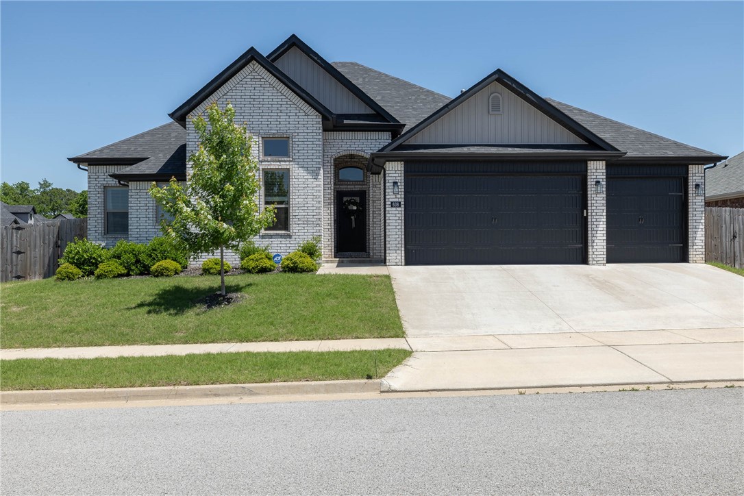 Beautiful all brick home in West Fayetteville’s Creekview S/D situated on a CORNER lot!! 2,200 heated and cooled sq ft includes 4 bedrooms, 2 full and 1 half bath, open living to eat in kitchen, dining, separate laundry, and a mudd room!!! This home was built in 2021 and is still just like NEW! Amenities include gorgeous white oak wide plank hardwood floors, gas range, corner pantry, corner gas log fireplace, double primary closets, covered patio, oversized privacy fenced backyard, and a 3 car garage!!!! Zoned for Farmington Schools.