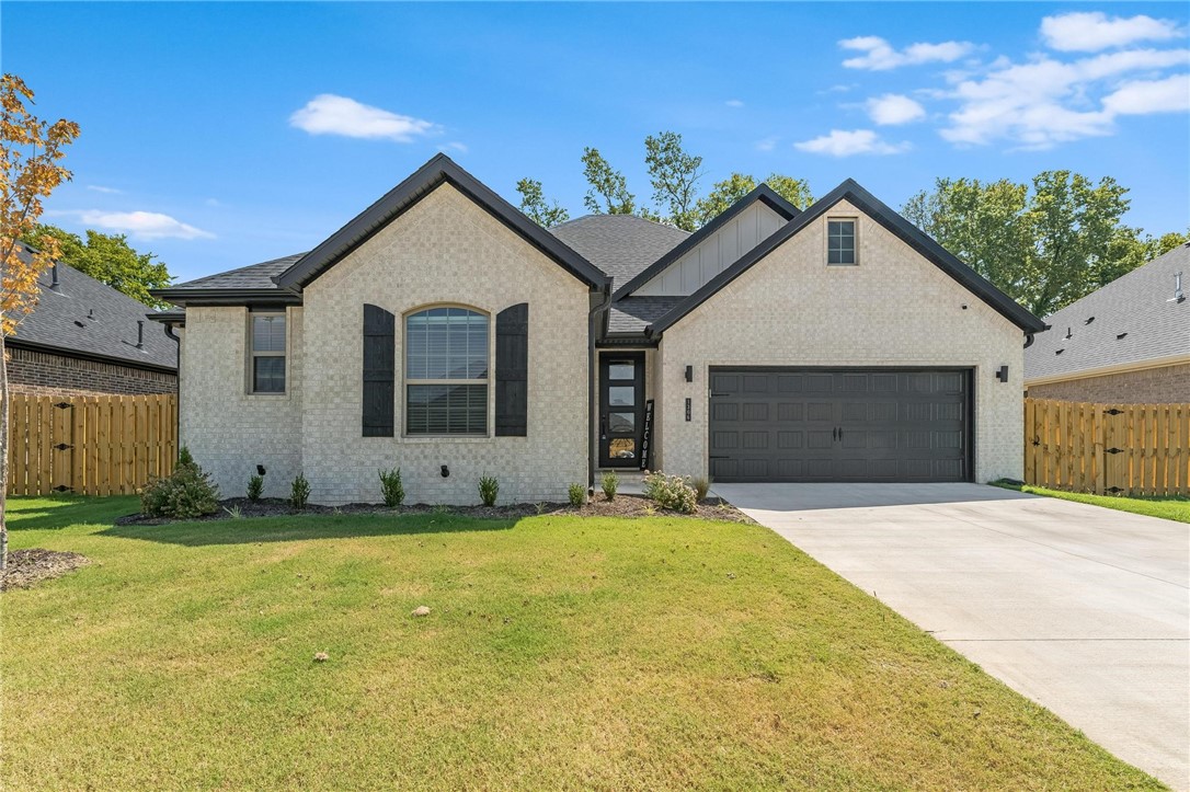 Just completed in June 2025 and barely lived in! This stunning 4-bedroom, 2-bathroom home in the desirable Yorktown subdivision offers like-new construction with thoughtful upgrades throughout. Features include a custom shiplap accent wall in the spacious living room, luxury vinyl plank (LVP) flooring in the master bedroom and walk-in closet, and modern finishes that elevate every space. Enjoy a functional split floor plan, open-concept kitchen/living area, and a private backyard perfect for relaxing or entertaining. Conveniently located near Pea Ridge Schools and the Walmart Neighborhood Market. This home is a must-see!