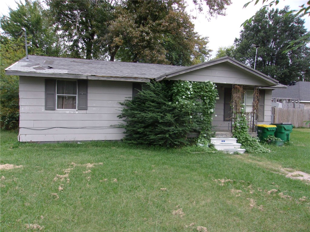 Fixer upper in town across from public school. Home has 3 bed, one bath. Nice level lot. Seller will do no repairs. As-Is
