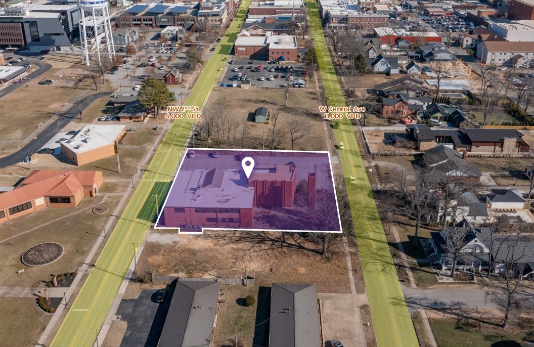 Rare development opportunity located in the heart of downtown Bentonville and between Central Ave and NW 2nd St which are major arteries connecting directly to the Bentonville Square. Property includes an exiting structure and large surface parking lot, providing flexibility for future development or interim use. Flat, buildable site which is ideal topography for redevelopment, minimizing prep and site work. Future Land Use Plan is Neighborhood Traditional.