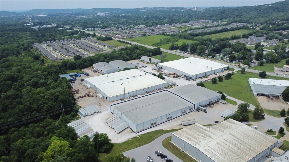 Rare industrial opportunity in Fayetteville located less than five miles from I-49.
This site includes 5 dock doors, 1 grade-level door, and 900 amp / 240 V / 3-phase power capacity.
Yard is available to lease.
Building size: ±20,000 – ±50,275 SF
Asking rent: $5.50 PSF
Rent type: NNN
Grade-level doors: 1 (14' x 12')
Dock-level doors: 5
Minimum wall height: 24'
Maximum peak height: 28'
Clear span: 21'
Parking spaces: Approximately 30–40
Power capacity: 900 amp / 240 V / 3-phase
Laydown yard: 0.75 AC