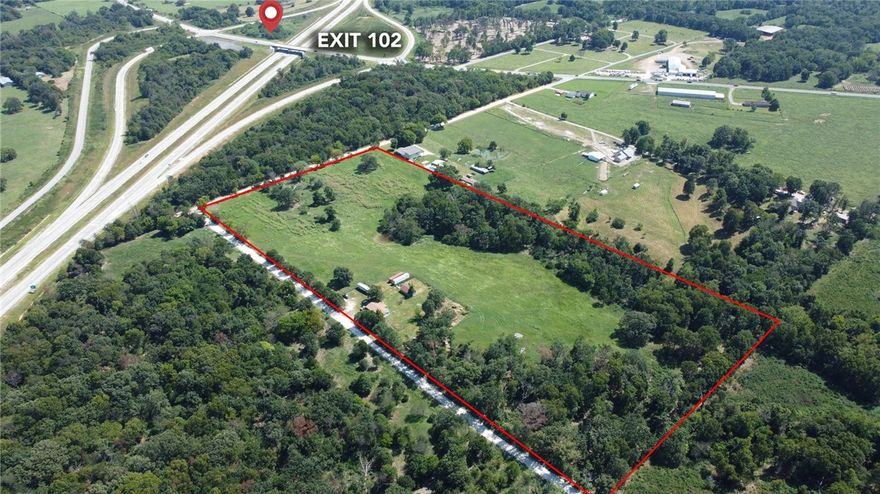 GREAT LOCATION! This 20 acres is in a desirable location for potential development near exit 102 of Interstate 49 and just off of Highway 72. It is so close to the interstate you can see the interstate from the east side of the property making it a prime location for investors or developers. An important feature is that Centerton water is available at the road along the land. This land is mostly level and cleared with minimal timber on the west and south side. There is an old house located on the property that is being sold as is with the land. The house is currently occupied by tenants. There aren't many opportunities to purchase 20 acres in such a prime location as growth develops in this area of Benton County. Schedule your showing appointment today to see for yourself the great potential of this property!