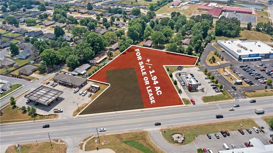 Your opportunity to capture +/- 1.94 Acres of prime commercial land in the thriving community of Farmington, offering outstanding development potential! This property features level, open terrain with significant road frontage along W Main St., which sees over 29,000 VPD! A cross access easement agreement with Walmart on the southwest side enhances accessibility. Utilities are conveniently available on-site or nearby. Surrounded by popular businesses, including Casey's General Store, Taco Bell, Walmart Neighborhood Market, and a 7 Brew planning to build right next to Casey's, this parcel is in a bustling area. Additionally, it is less than 1.6 miles from Farmington High School and it's newly built $16 million sports complex, and only 6 miles from the University of Arkansas. This is an exceptional opportunity to invest in a rapidly growing area!