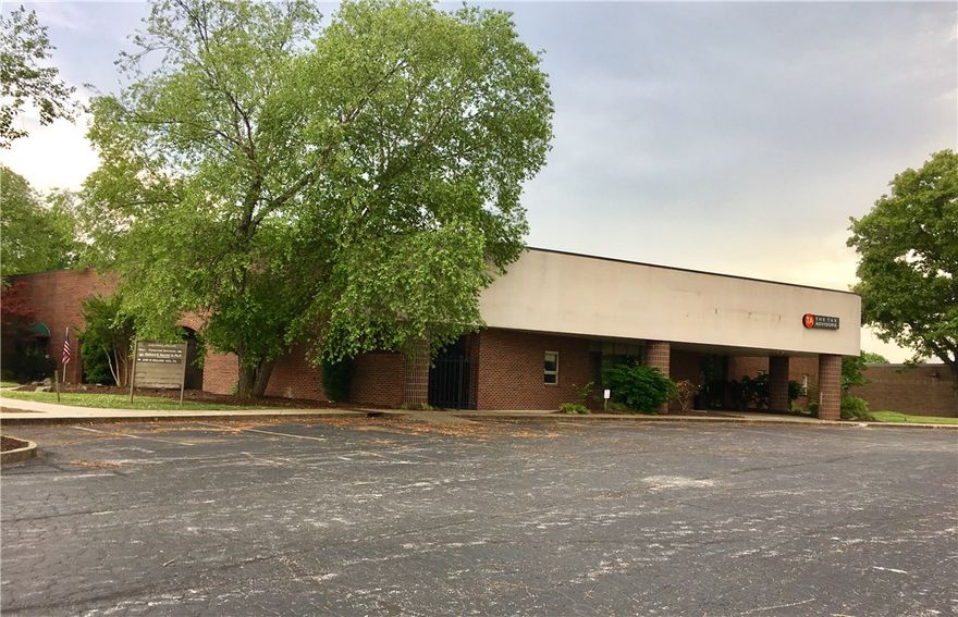 Ideal for Owner/investor/user/Redevelopment!  Currently office use, can be converted back to RETAIL. Much of the front half of bldg. can be "blown out" & reconfigured to Your Use! Retail/Service or office. Brown Brick Building on 1.67 acres; partially occupied by Dentist & Tax office.  Other units are vacant.  Opportunity for OWNER/USER while receiving some rental income. (around $1700/mth) 1st Picture is space plan of suites F, G, H, I. (The Medical Space).